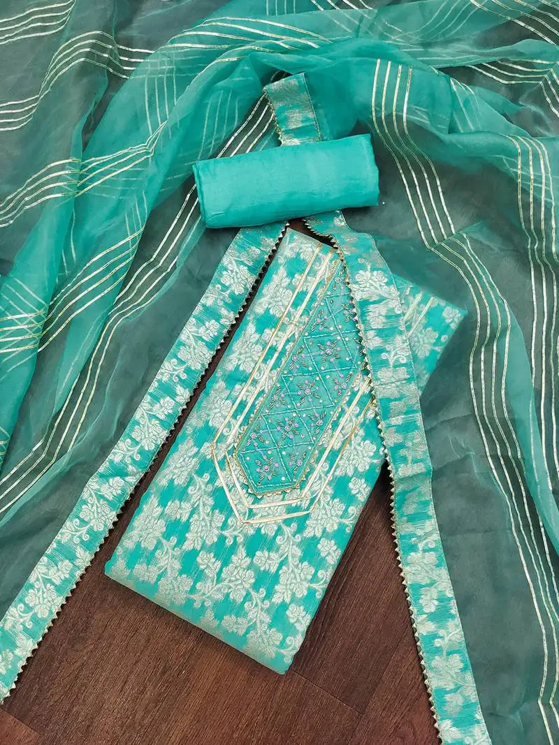 Sea green graceful jacquard dress material with handwork & organza lace dupatta unstitched