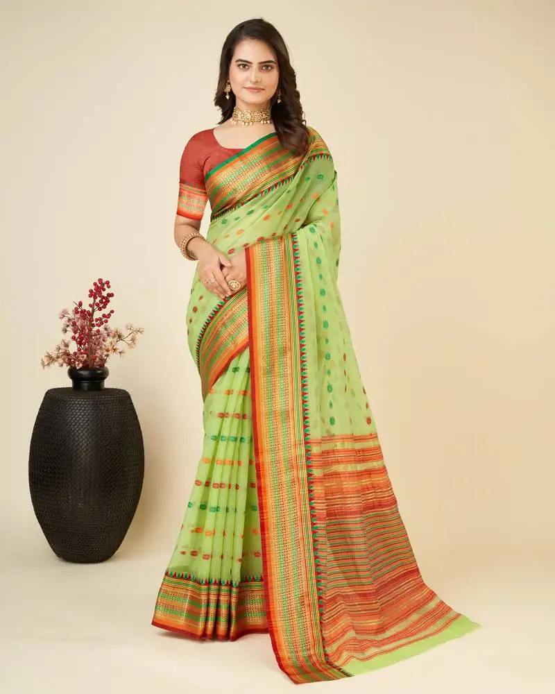 Green silk blend contrast zari border saree with matching blouse