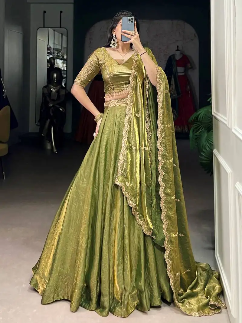 Mesmerizing green organza mehendi wear lehenga choli with dupatta