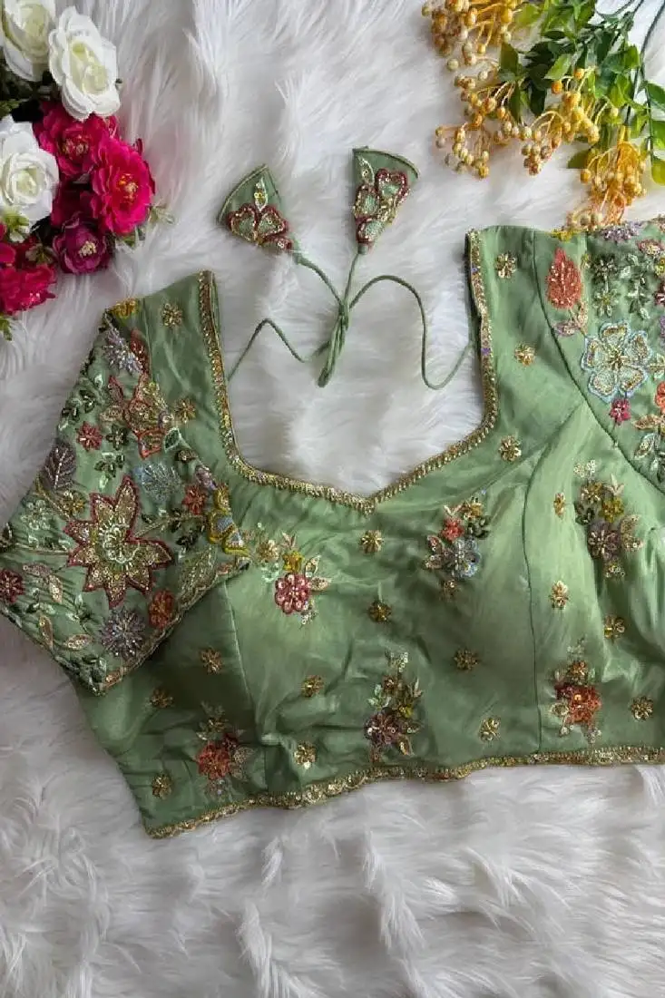 Pista green deep neck partywear sequence blouse alterable upto 42 size