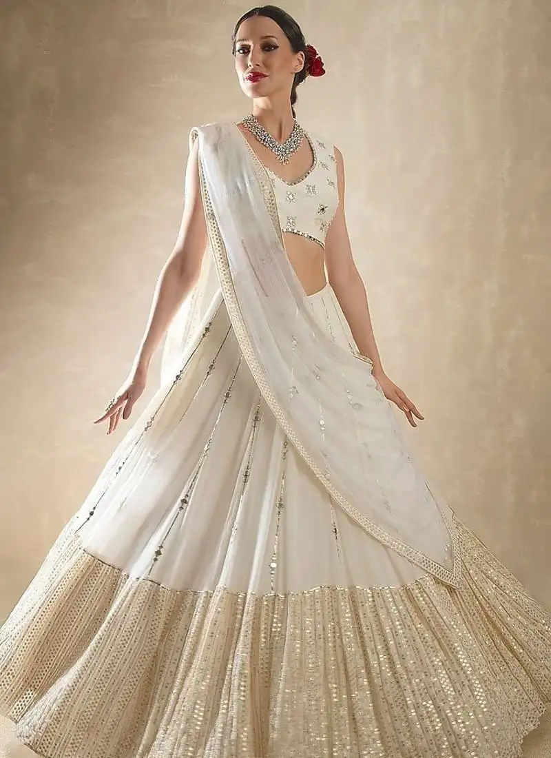 Off white zari and sequins embroidered georgette lehenga choli