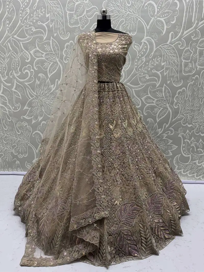 Beautiful golden net sequins bridal wear lehenga choli with dupatta