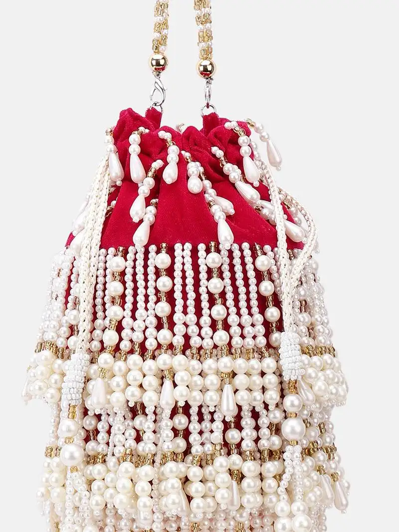 Embroidered indian bridal potli for weddings magenta