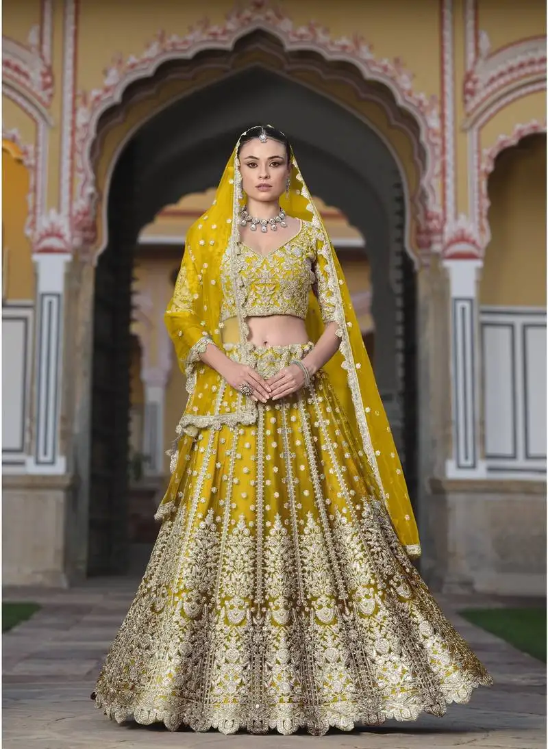 Indian wedding bridal wear net yellow lehenga choli semi stitched embroidery sequence work