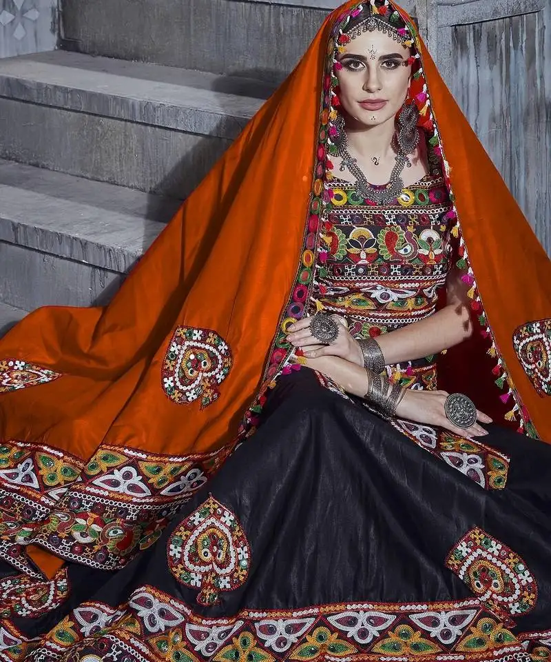 Black and orange designer special gamthi work lehenga choli with traditional dupatta for this navratri