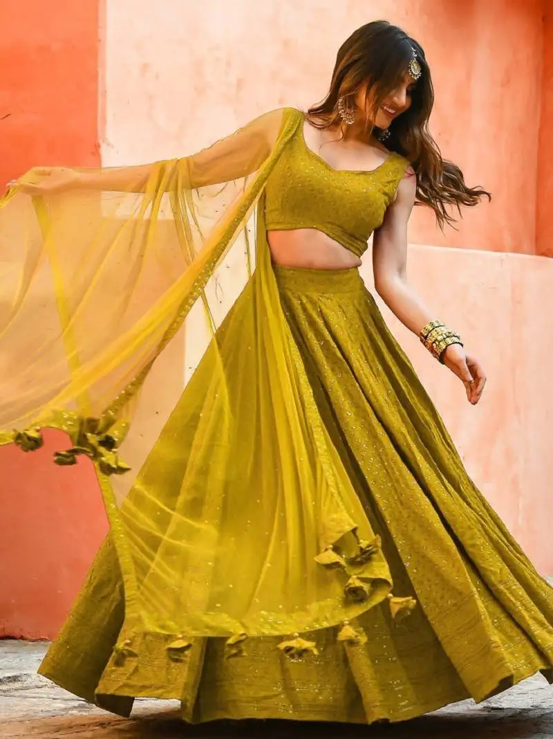 Fabulous mustard yellow sequins and thread embroidered georgette reception indian wedding bridal lehenga choli dress