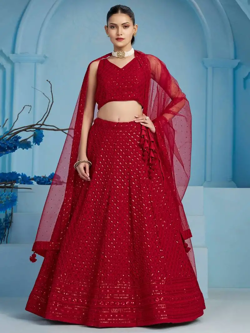 Red colored sequins and thread embroidered georgette lehenga dress