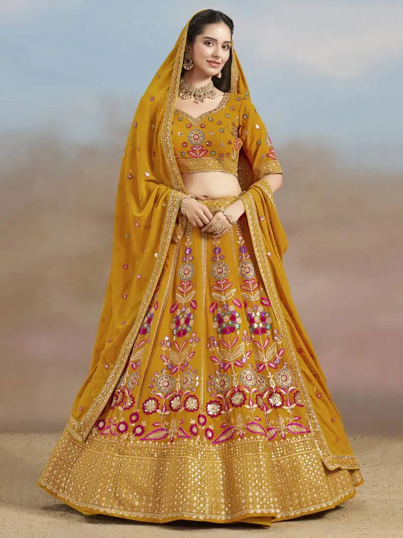 Mustard yellow sequins, zari, dori and multi color thread embroidered georgette designer wedding indian dress lehenga