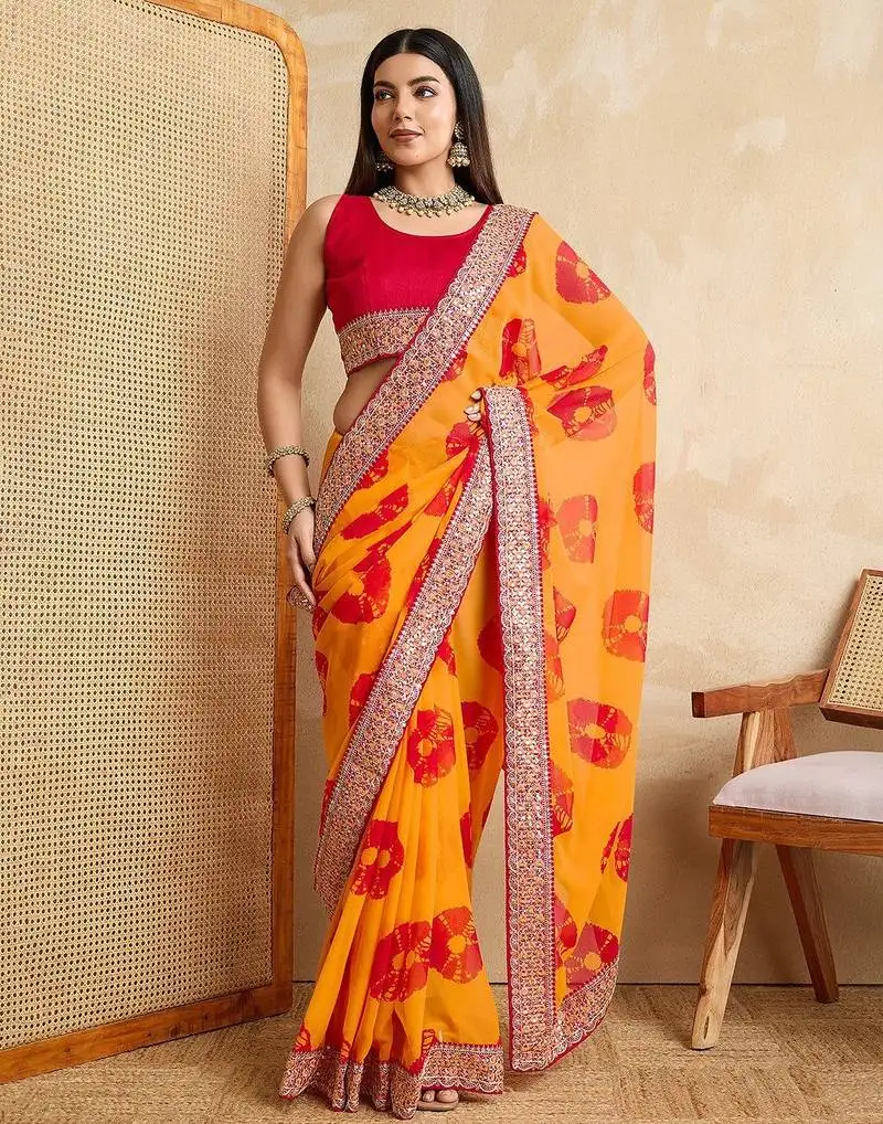 Yellow party wear soft georgette bandhej saree