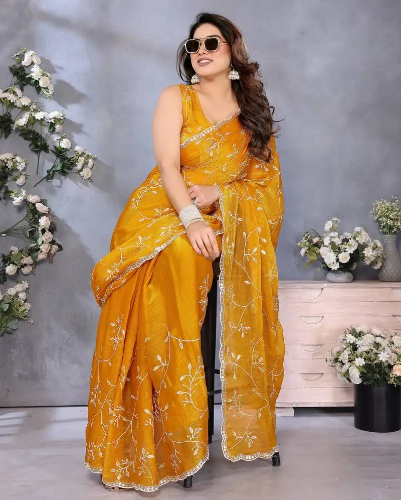Vibrant yellow embroidery work jimmy chu saree with designer blouse
