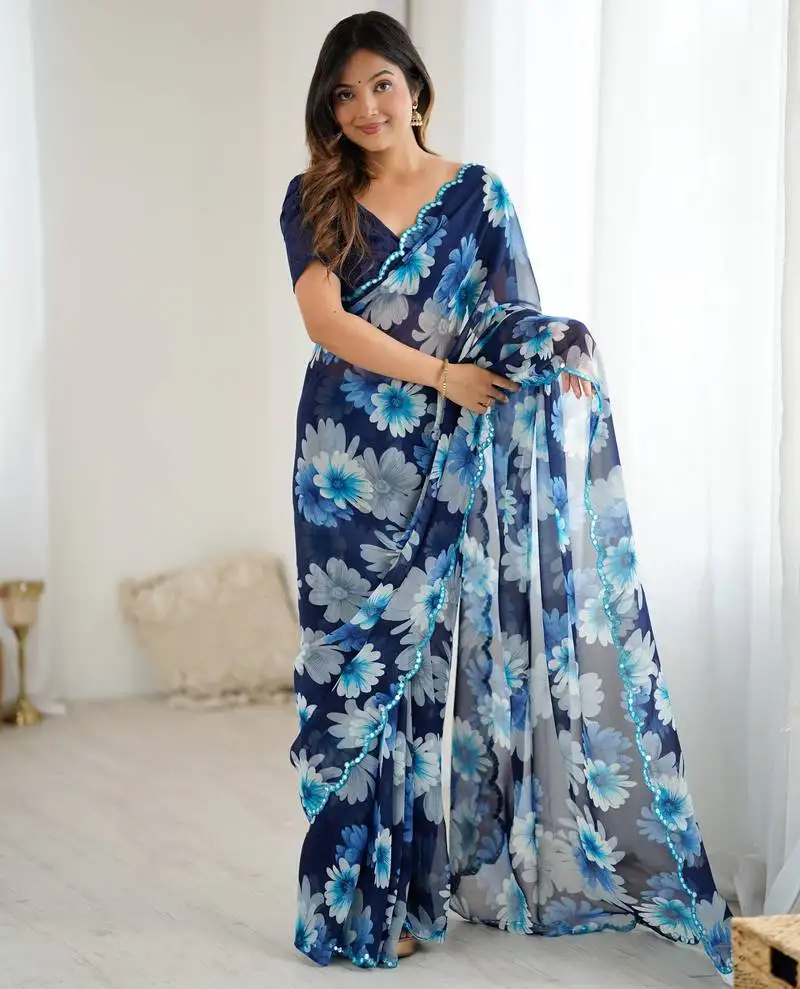 Blue georgette flowers printed mirror work border saree