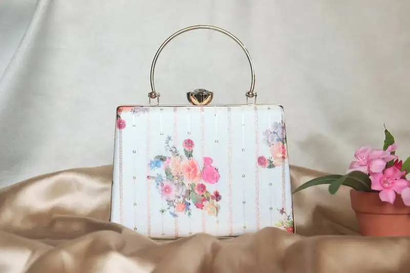 Ivory garden box cliutch