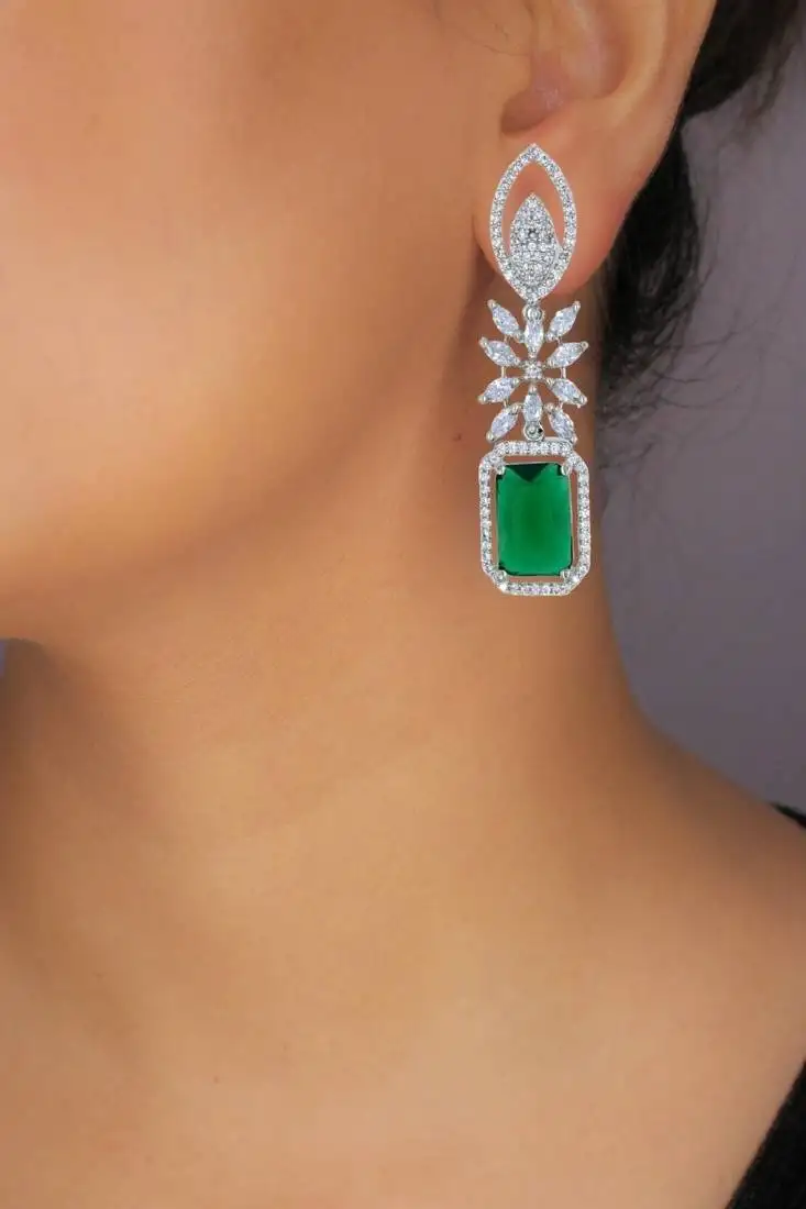 Green rhodium plated zircon green synthetic stone drop earrings