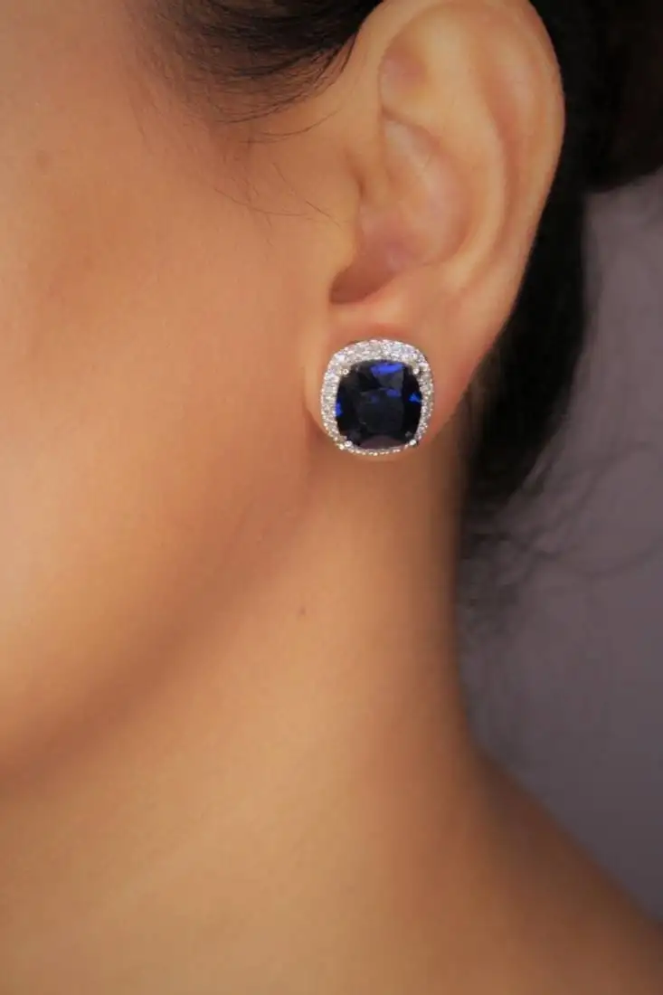 Blue rhodium-plated ad studded blue synthetic stone stud earrings