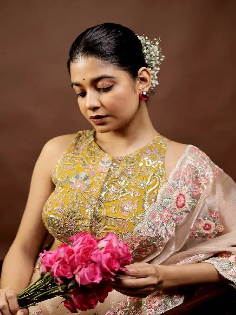 Green embroidered designer blouse