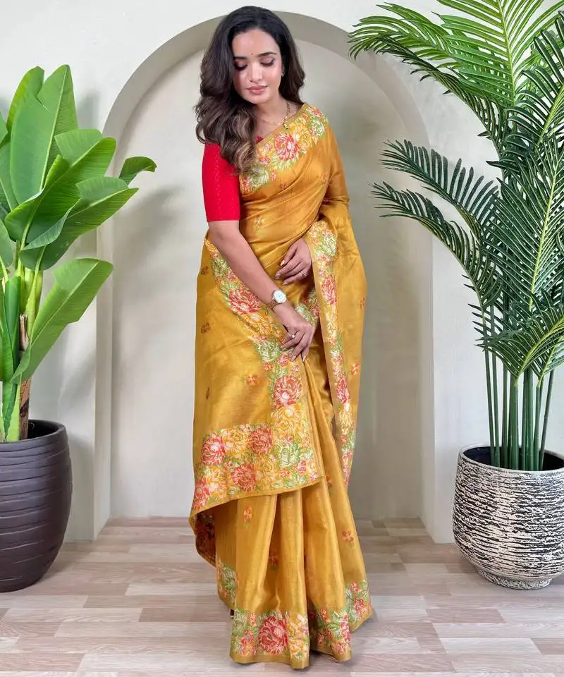 Yellow jacquard zari weaving tissue saree