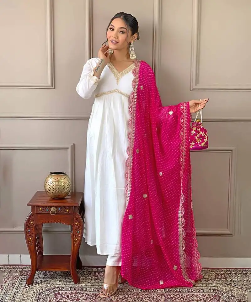White kurta set with pink dupatta stitched