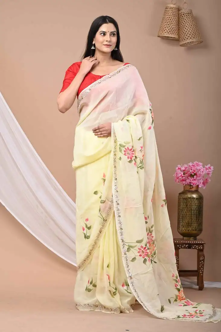 Yellow hand painted saree with gotta work