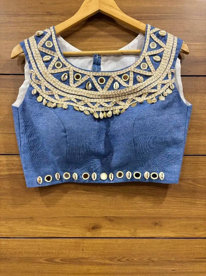 Denim jute lace work and real mirror handwork and kodi work sleeveless blouse