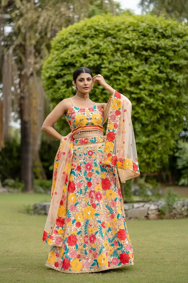 Women's multicolored georgette thread and sequins embroidred work lehenga choli for bride