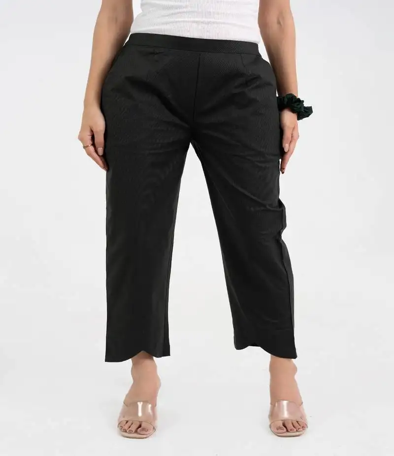 Black cotton solid pant with leaf bottom