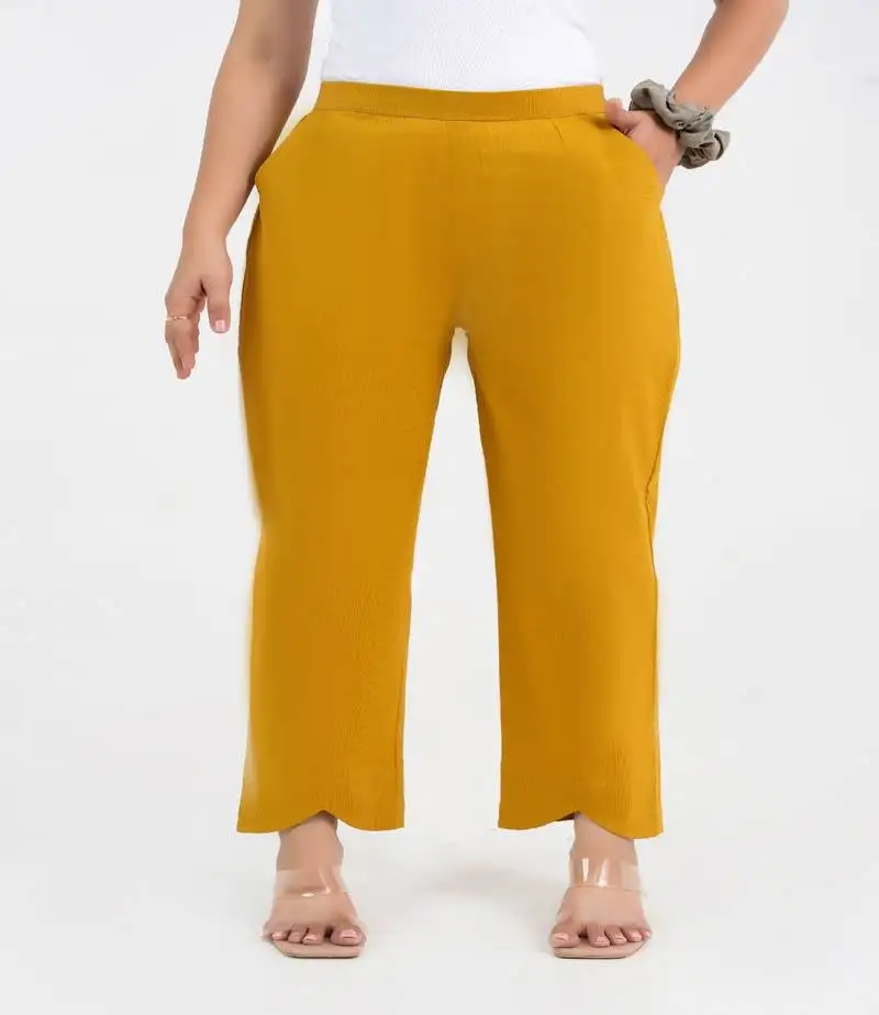 Mustard cotton solid pant with leaf bottom