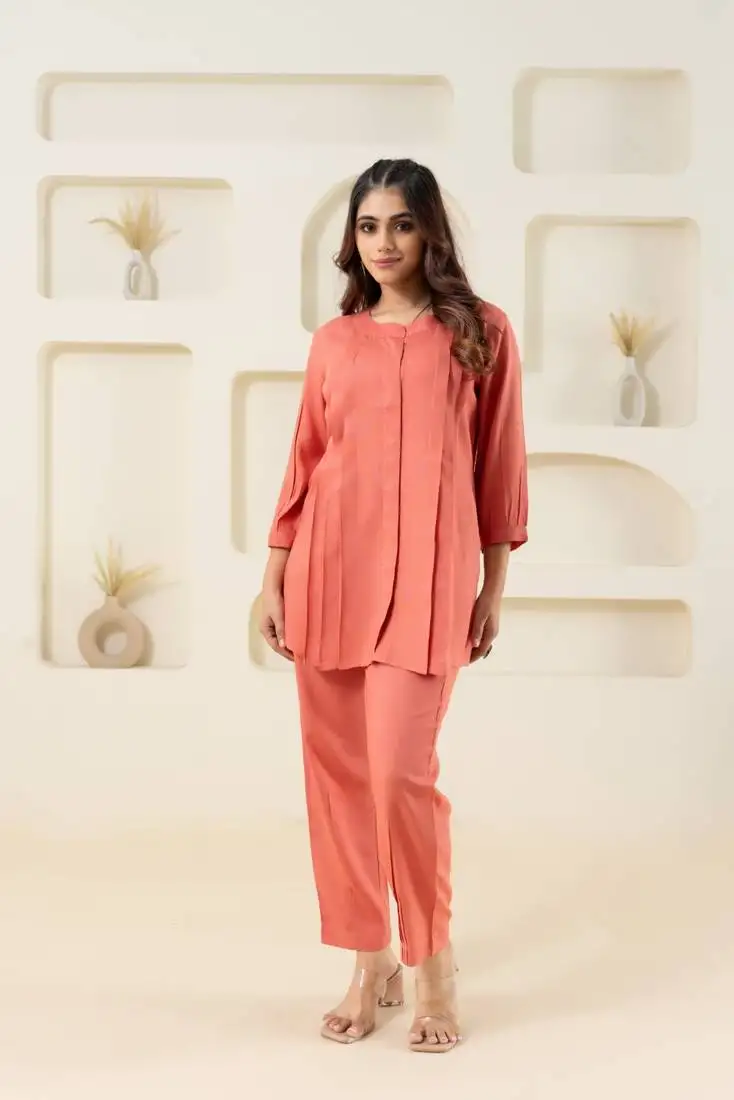 Peach pleated flared solid top