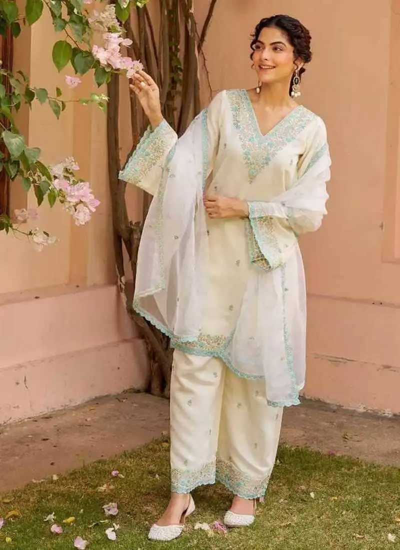 Elegant white chanderi kurta set with soft blue embroidery accents