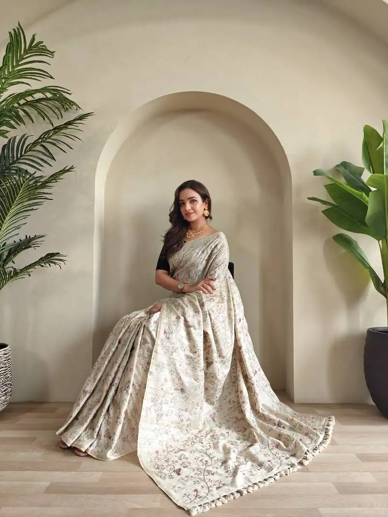 Beige pure loom tussar saree with all over designer embroidery