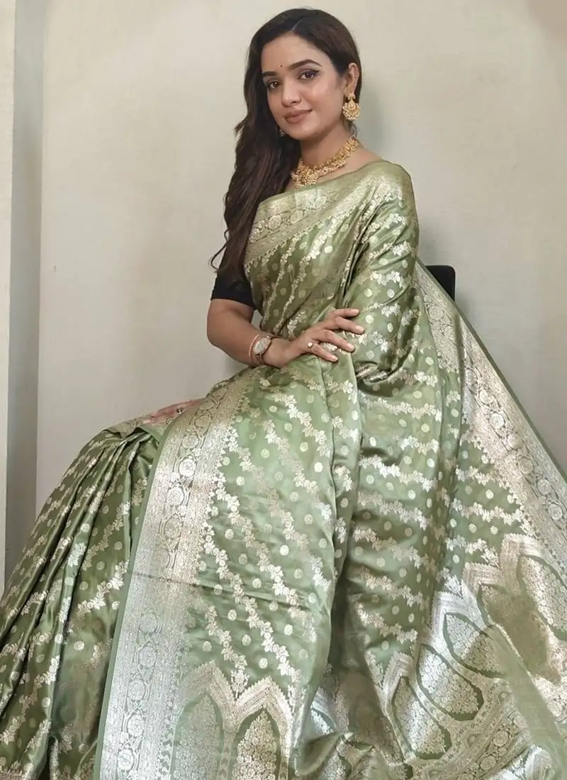 Parrot green mashru satin saree with leheriya weaving design