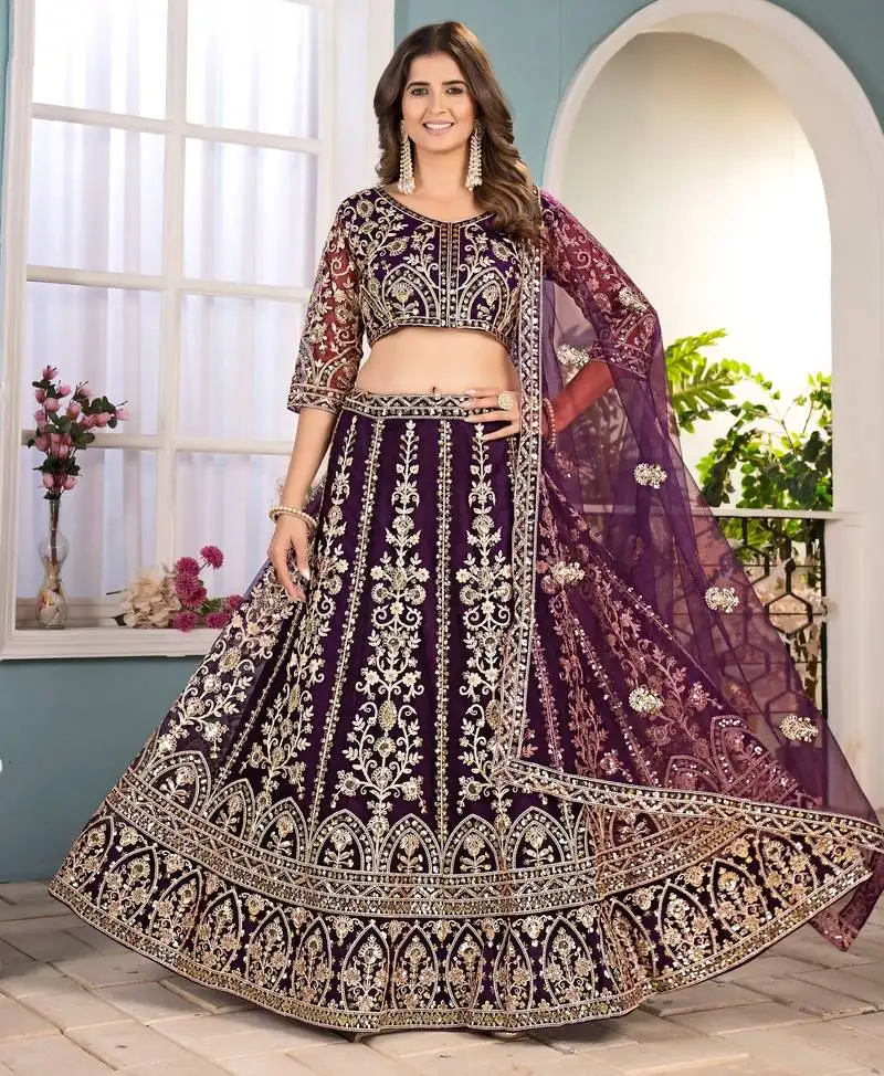 Purple embroidered sequin net lehenga choli