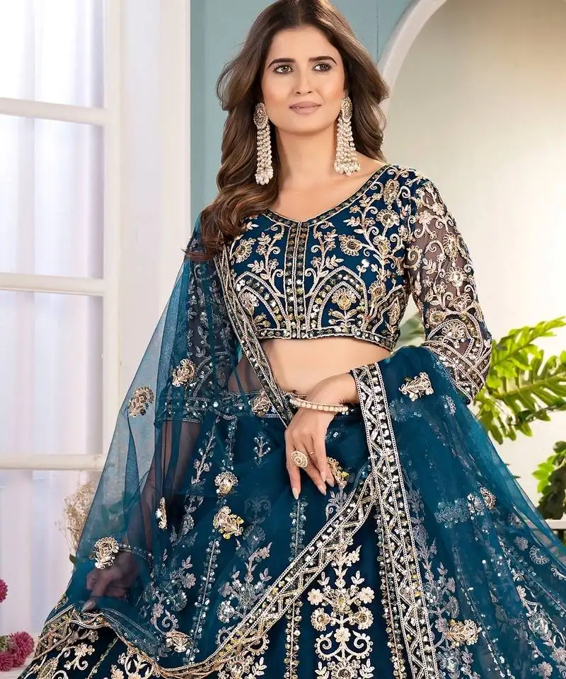 Teal embroidered sequin net lehenga choli