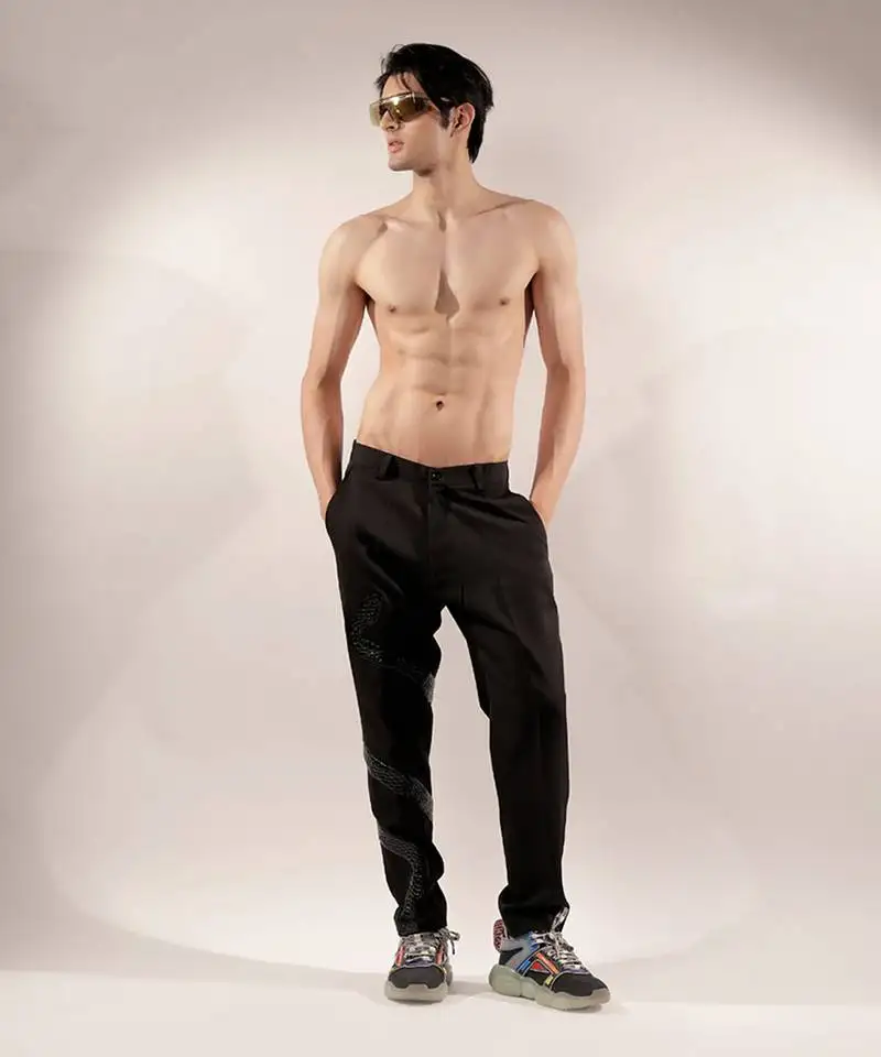 Snake quilted black cotton pants