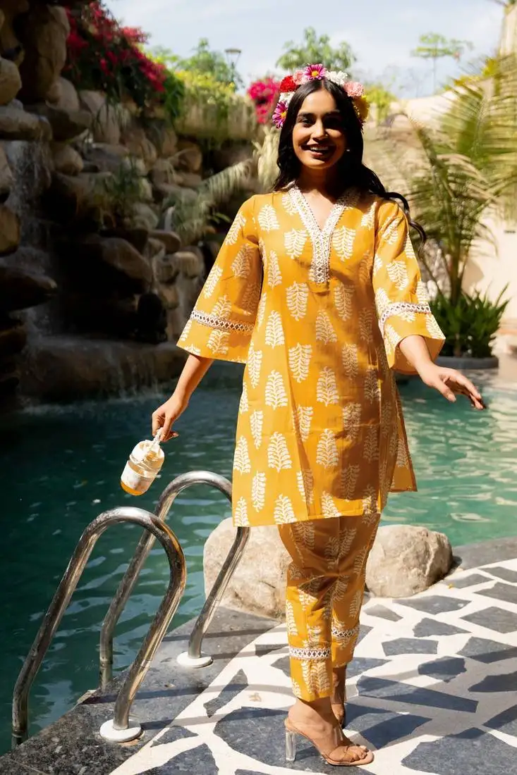 Women's yellow orange regular fit cotton paisley printed kurta with pant