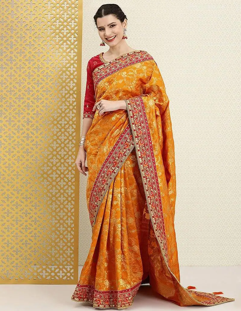 Yellow silk blend embroidered saree with unstitched blouse piece