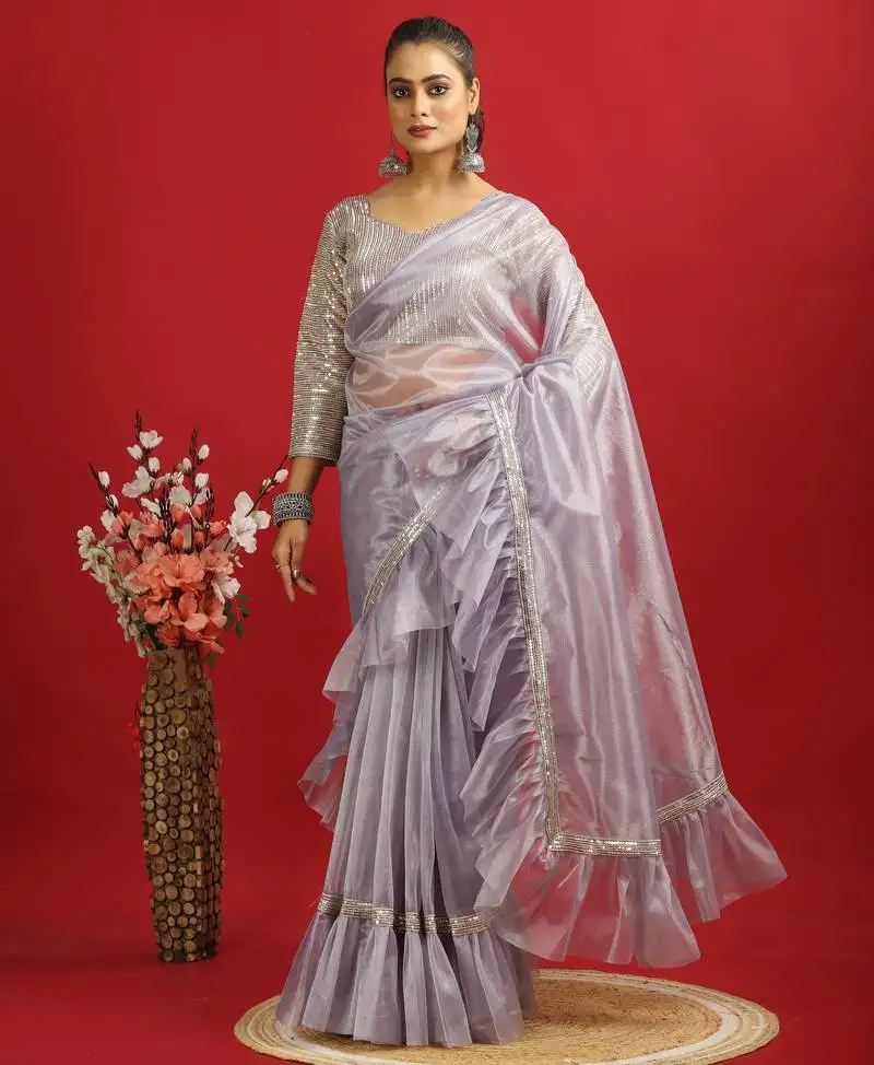 Purple embroidery twill net saree with sequin blouse