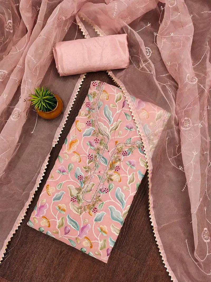 Peach unstitched sequence work organza dress material.