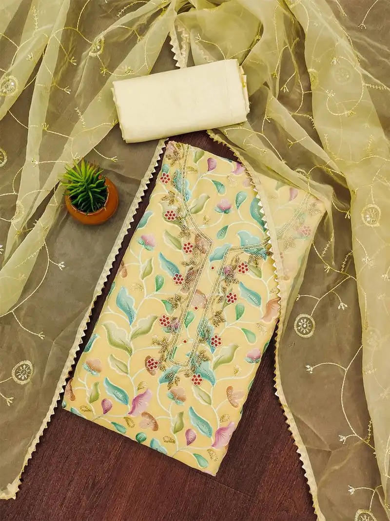 Yellow unstitched sequence work organza dress material.