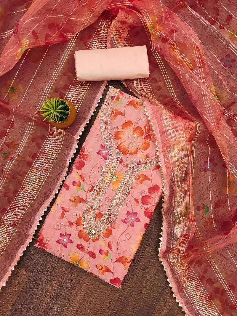 Peach floral printed organza salwar suit material with embroidered neckline unstitched