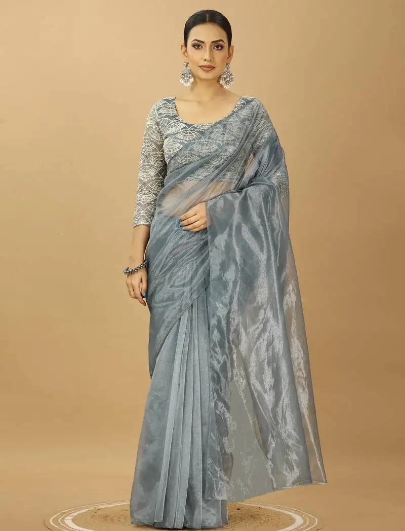Grey twill net saree with sequin blouse
