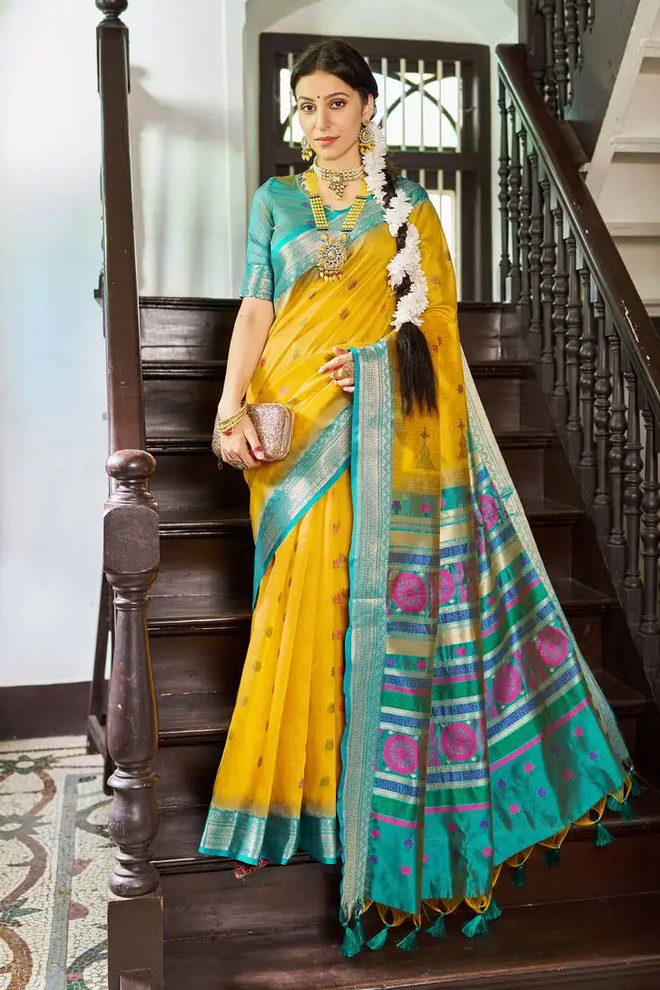 Yellow elegant slub blend linen thread work tassels saree with blouse