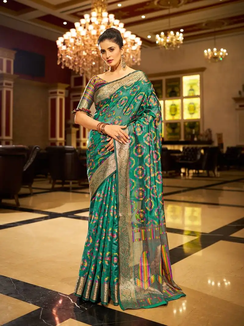 Firozi organza silk blend zari border festive wear saree with blouse piece