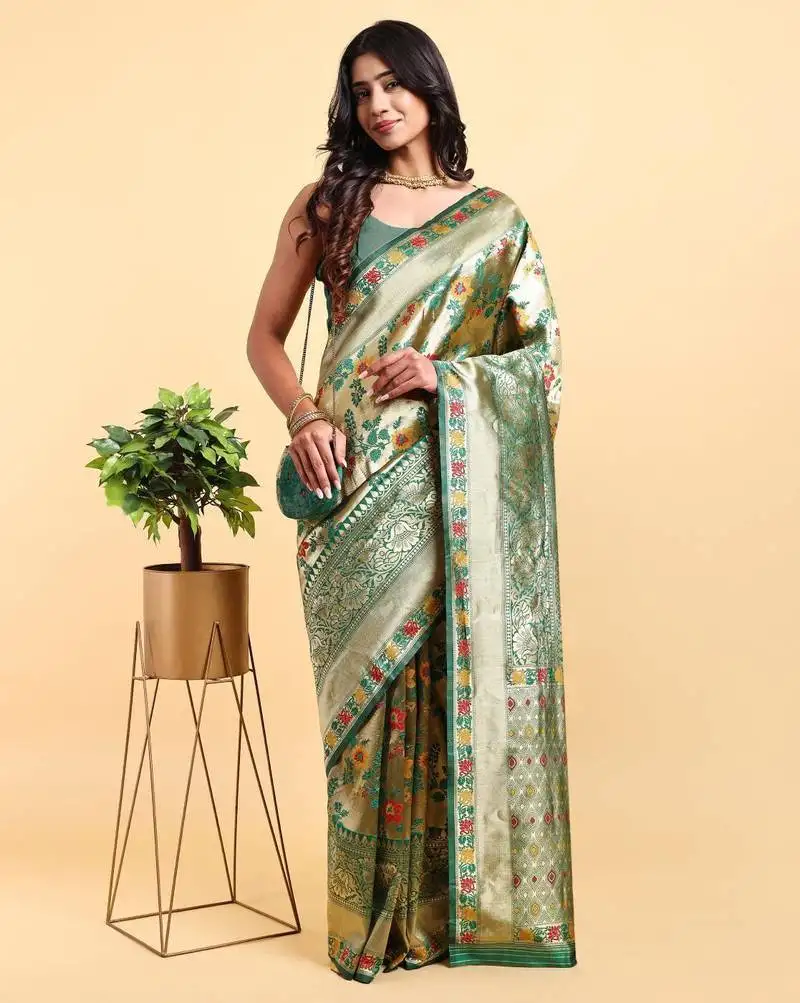 Golden and green zari woven floral pattern saree with blouse piece
