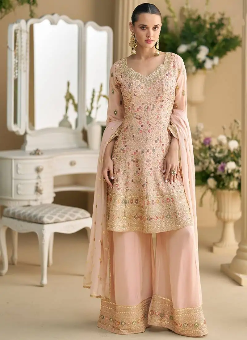 Heavy wedding wear pink georgette peplum style suit for women semi stitched