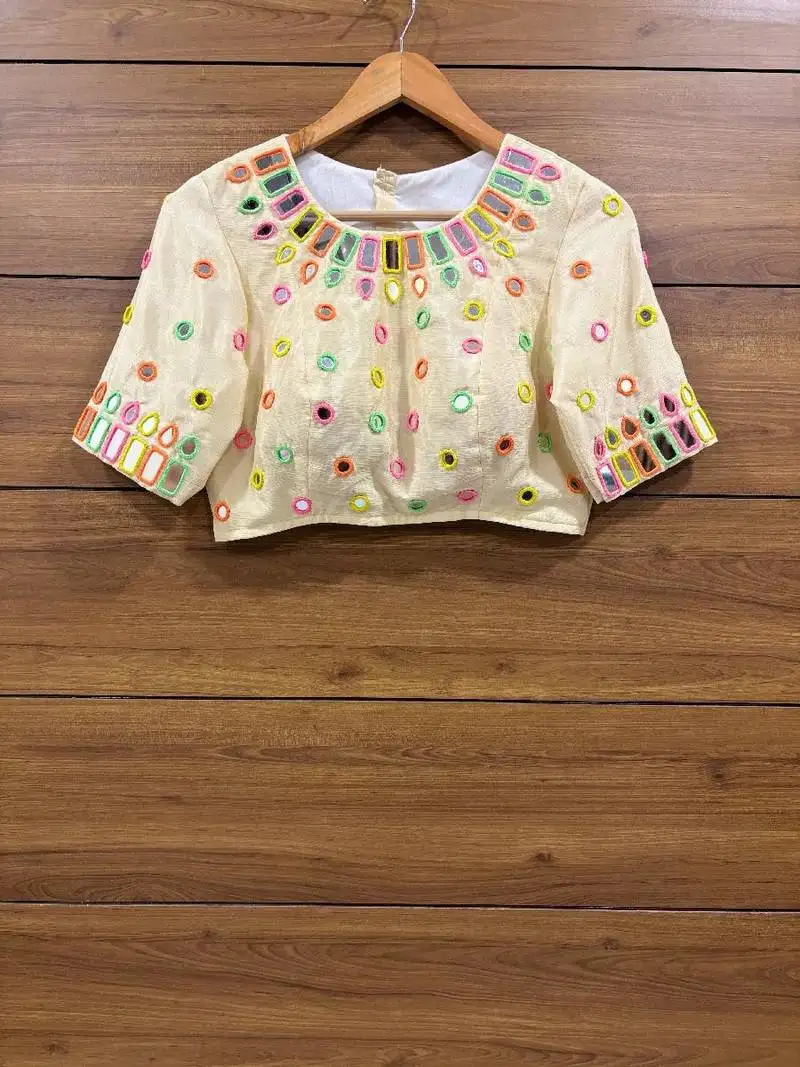 Off white real mirror work of multi colour threads sleeveless blouse