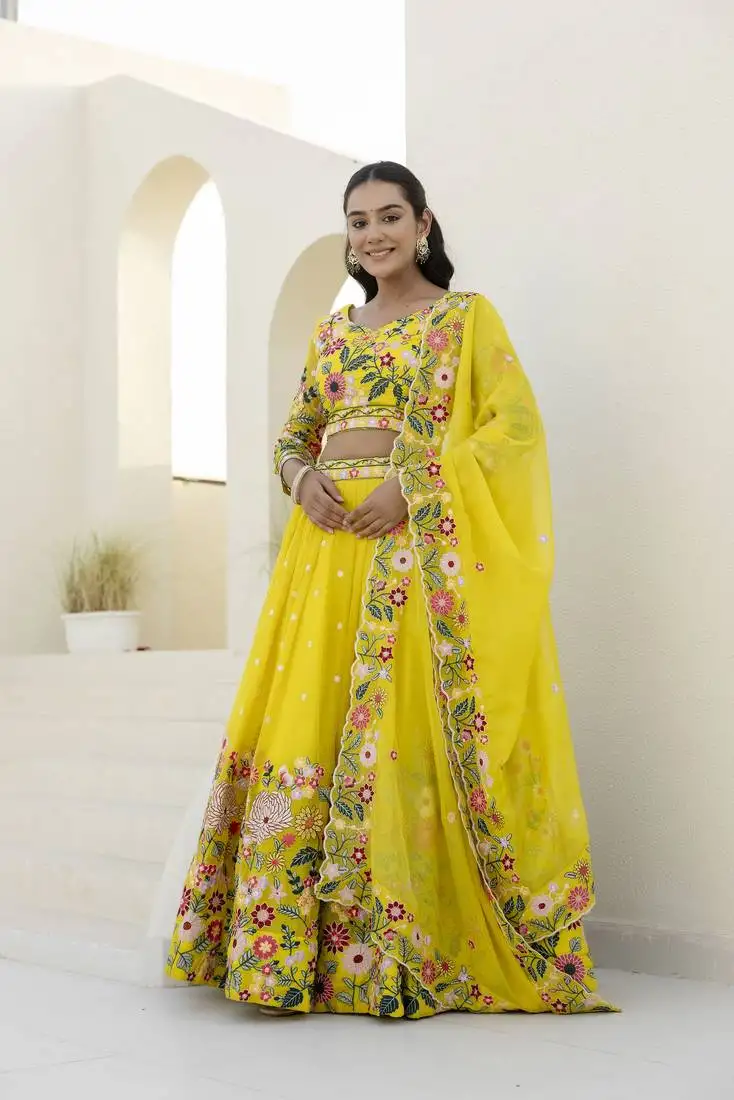 Yellow organza heavy floral thread sequins work lehenga choli