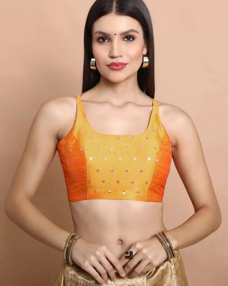 Yellow brocade sleeveless readymade blouse