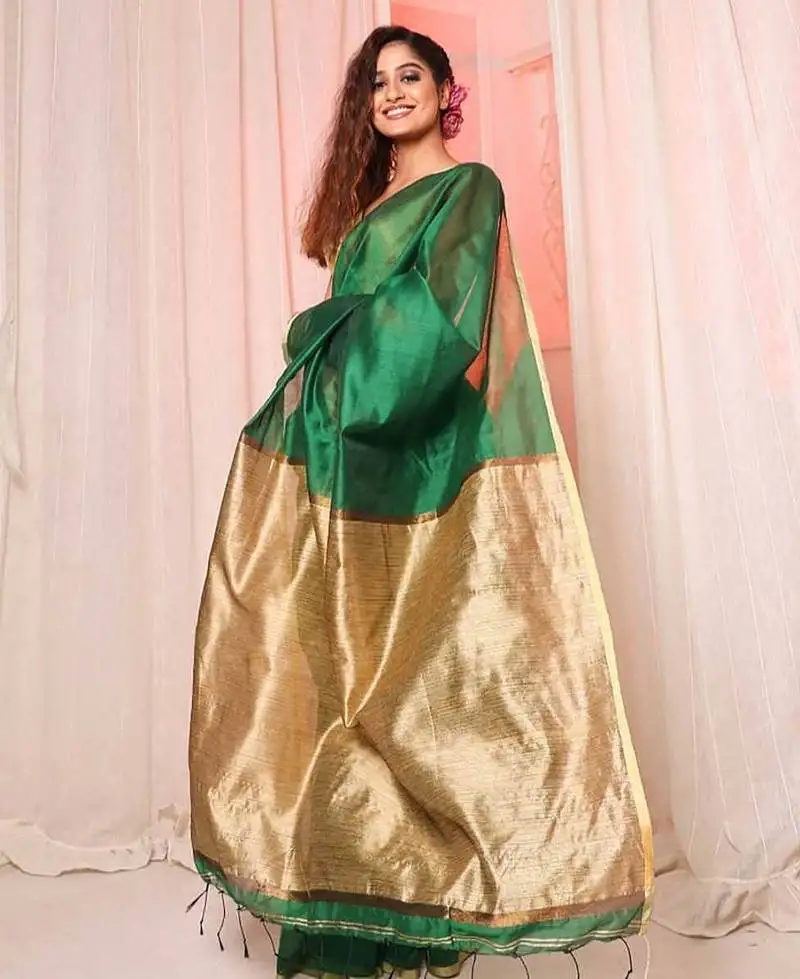 Green handloom cotton silk saree with running blouse piece