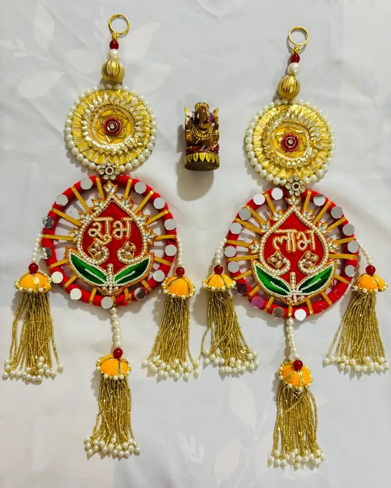 Raditional shubh labh wall hanging with golden tassels & beaded detailing