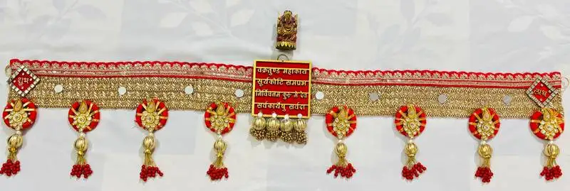 Traditional decorative door toran with beads, bells & floral embellishments